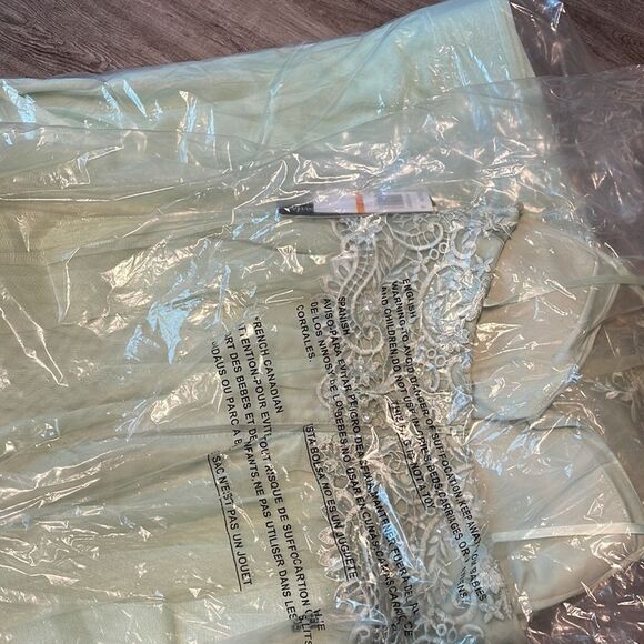 Embroidered Halter Gown
SEQUIN HEARTS - Picture 3 of 3